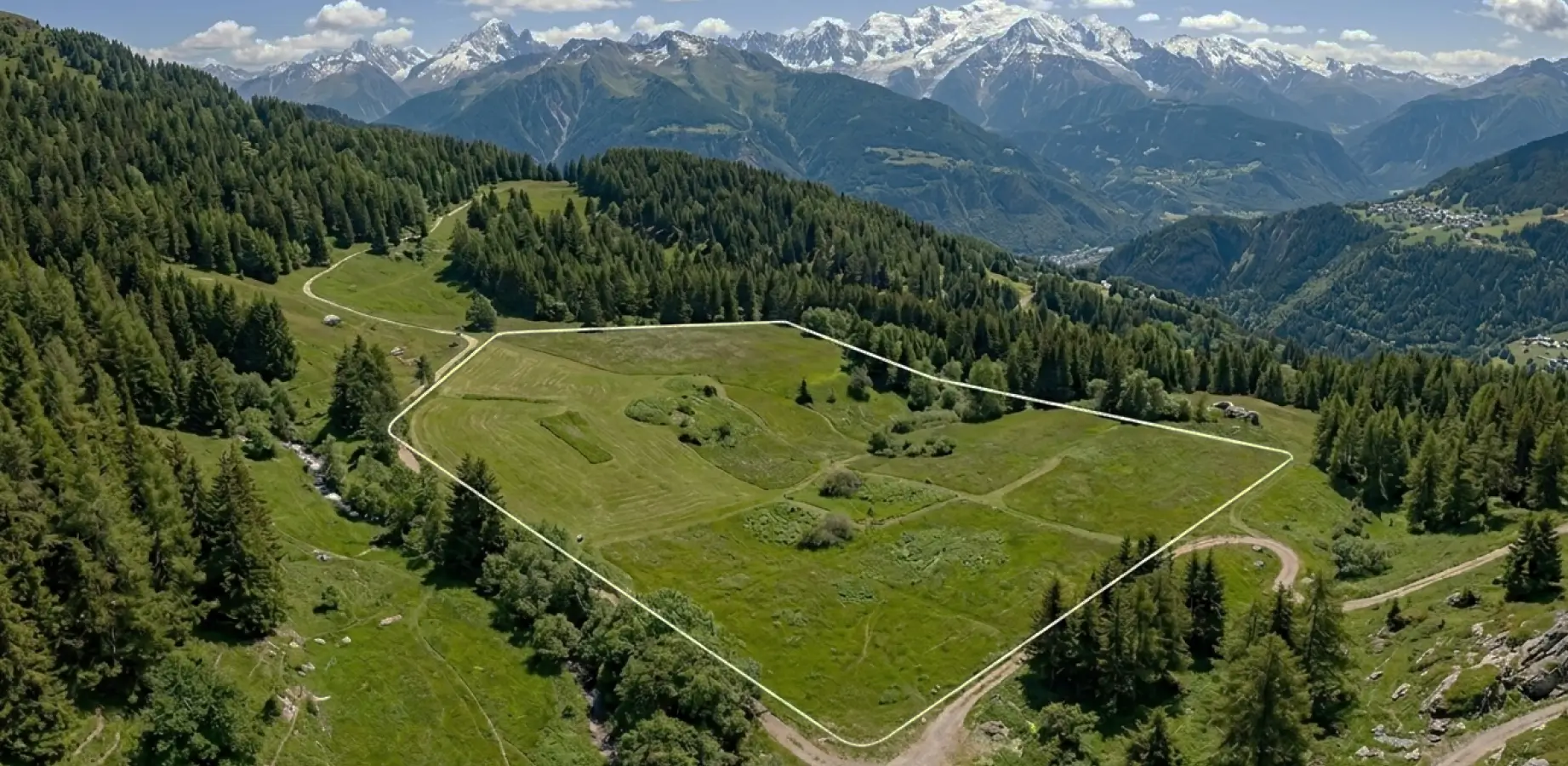 Vue aérienne d'un terrain borné en Savoie avec bornes cadastrales visibles